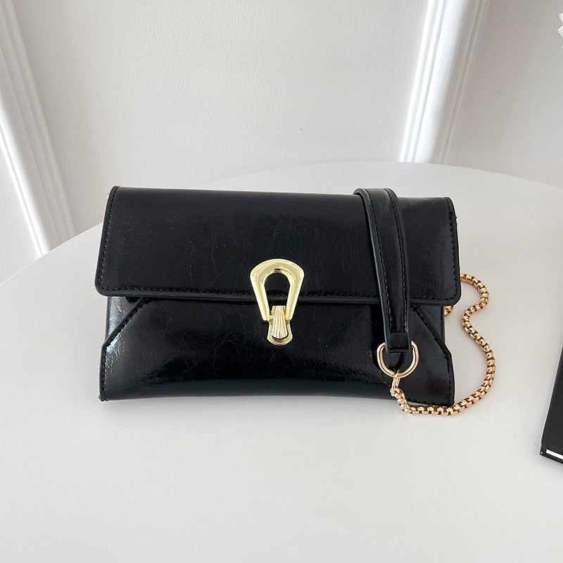 Damen elegante Handtasche im zeitlosen Design mit metallischen Akzenten Nord Taschen