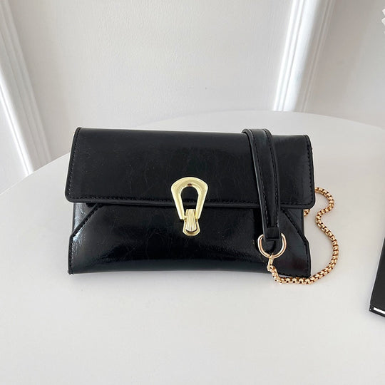 Damen elegante Handtasche im zeitlosen Design mit metallischen Akzenten Nord Taschen