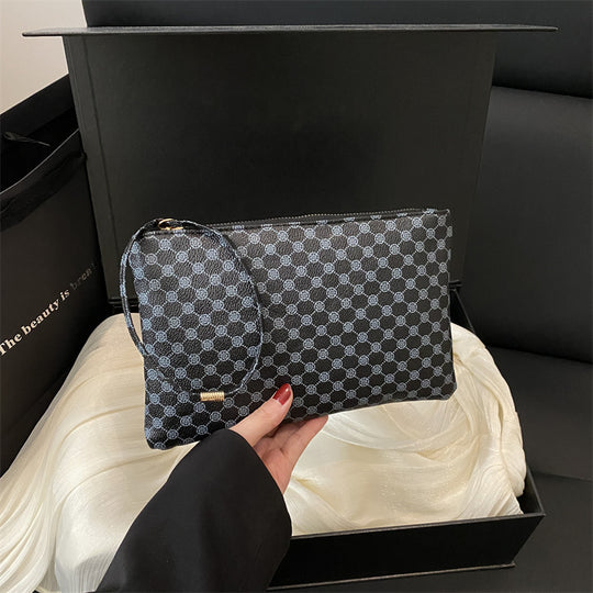 Damen Clutch mit elegantem Ringgriff Nord Taschen