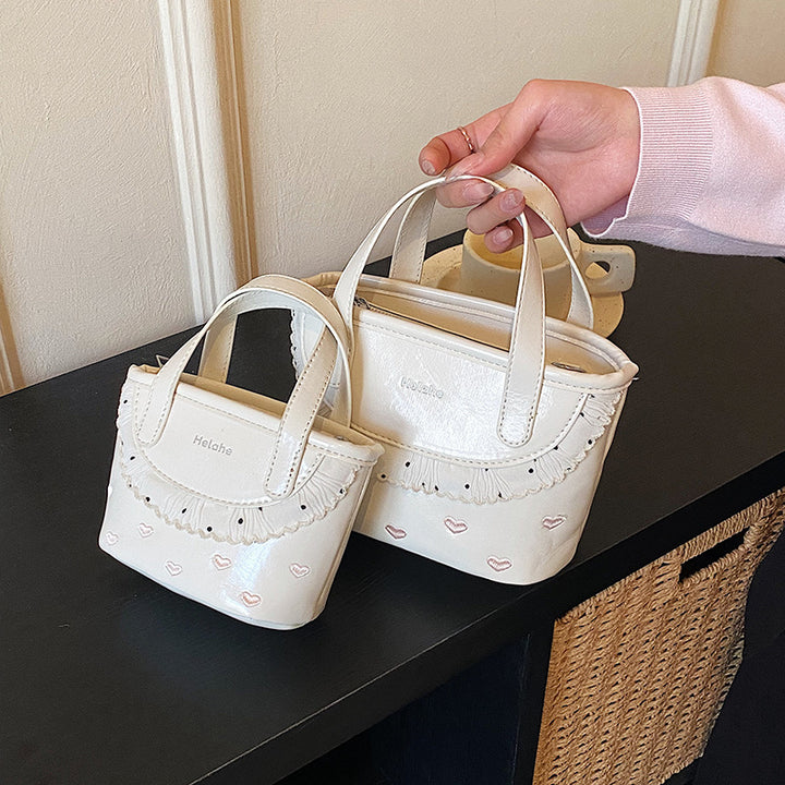 Damen modische Handtasche mit verspieltem Rüschendesign Nord Taschen