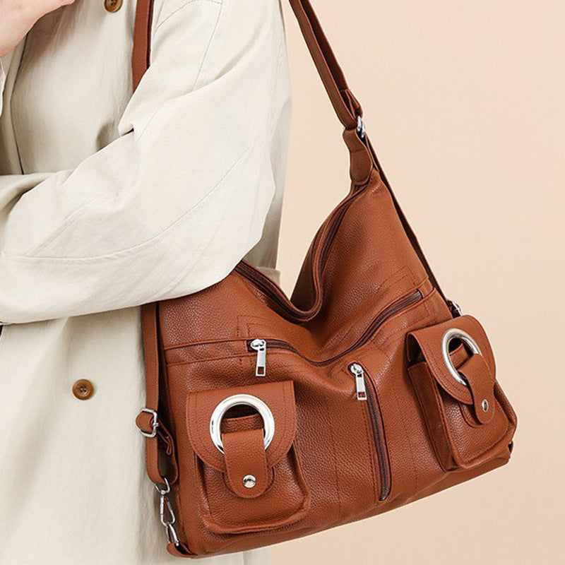 Damen Hobo-Tasche mit praktischen Vorderfächern und eleganter geschwungener Silhouette Nord Taschen