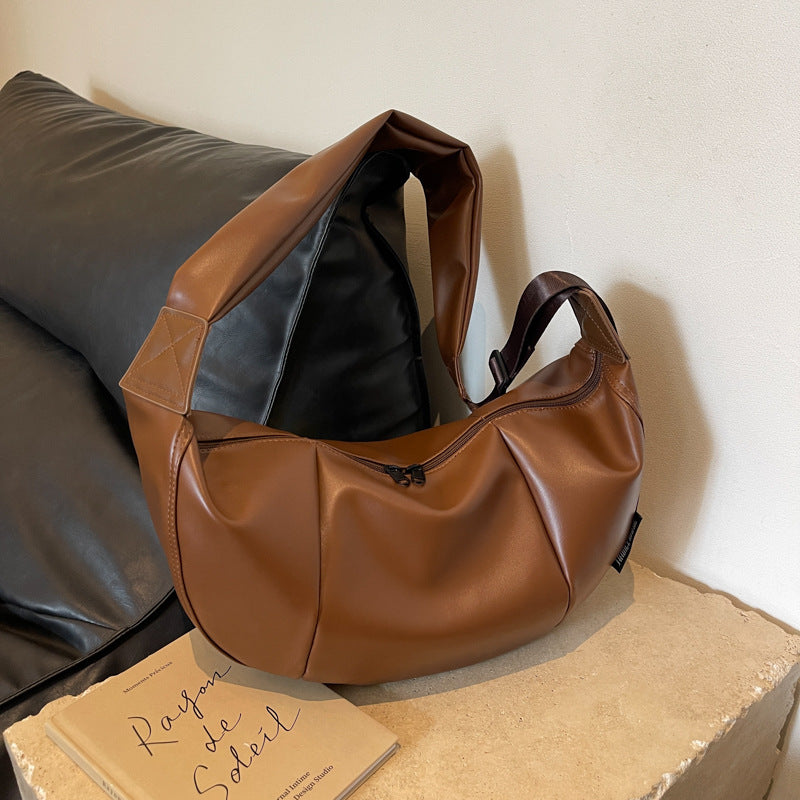 Damen Umhängetasche aus weichem Kunstleder mit modernem Design Nord Taschen