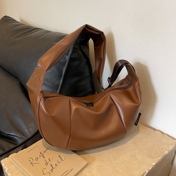 Damen Umhängetasche aus weichem Kunstleder mit modernem Design Nord Taschen