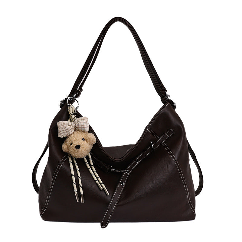 Damen Handtasche mit verspieltem Anhänger Nord Taschen
