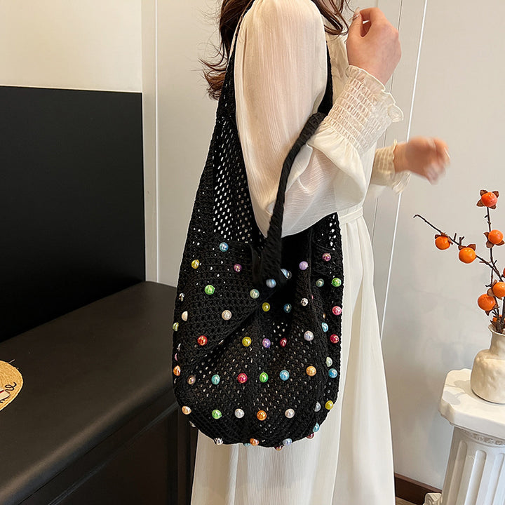 Damen stilvolle Beuteltasche aus geflochtenem Netzmaterial mit bunten Perlen Nord Taschen