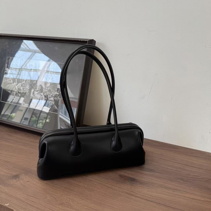 Damen elegante Henkeltasche mit geschmeidigem Kunstleder Nord Taschen