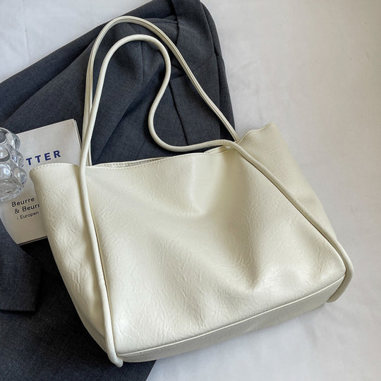 Damen elegante Schultertasche mit weichem Kunstleder und großzügigem Innenraum Nord Taschen
