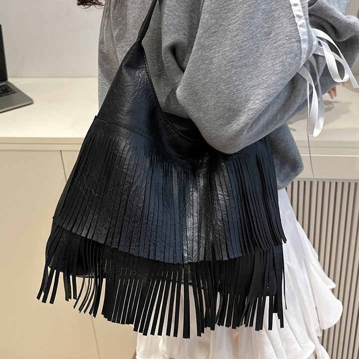 Damen Umhängetasche mit fransigem Design und robustem Tragegriff Nord Taschen