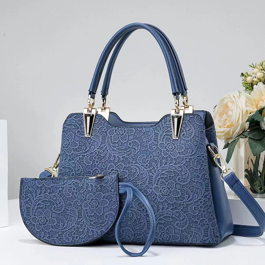 Damen elegante Handtasche mit filigranem Spitzenmuster und abnehmbarer Clutch Nord Taschen