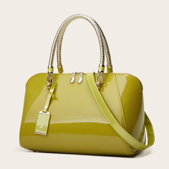 Damen Handtasche mit eleganter Lackoberfläche und geflochtenen Griffen Nord Taschen