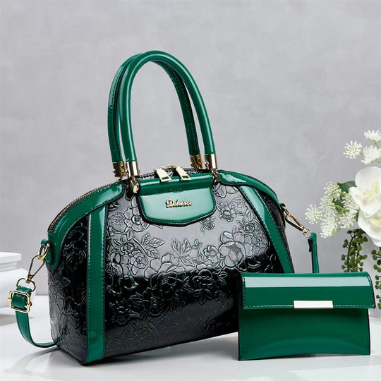 Damen modische Handtasche mit floralen Prägungen und Glanz-Akzenten Nord Taschen