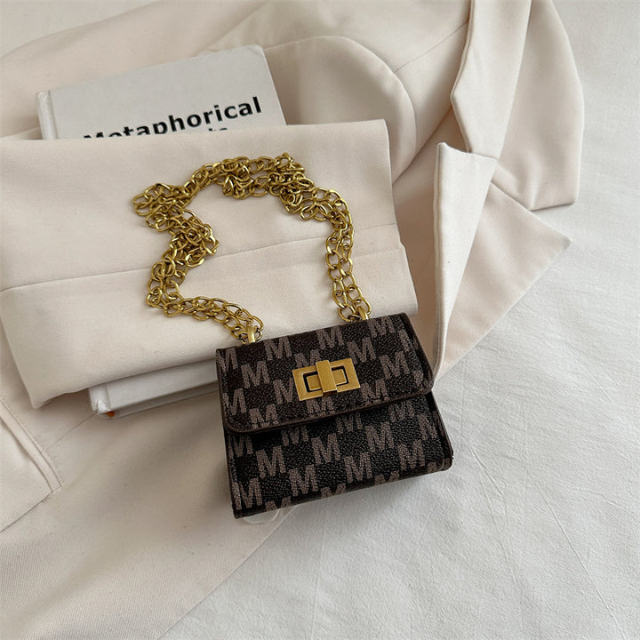 Damen Mini-Portemonnaie mit eleganter Kettenverzierung Nord Taschen