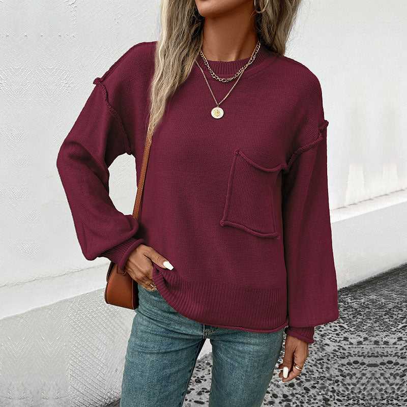 Damen Oversize Rundhals-Strickpullover mit aufgesetzter Brusttasche und fransiger Saumnaht Nord Taschen