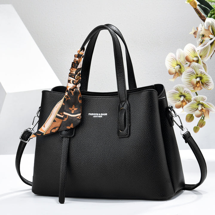 Damen elegante Handtasche mit dekorativem Schal Nord Taschen