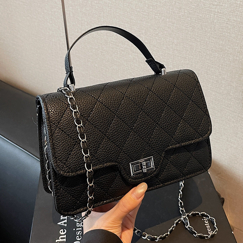 Damen Handtasche mit eleganter Steppung und schickem Metallverschluss Nord Taschen