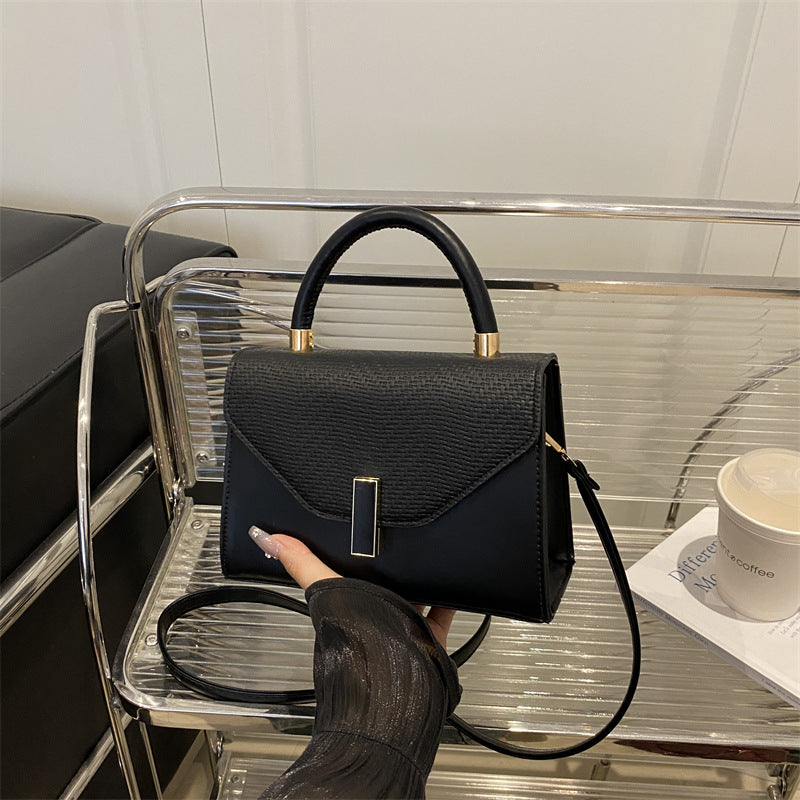 Damen elegante Umhängetasche mit strukturiertem Leder und glänzenden Akzenten Nord Taschen