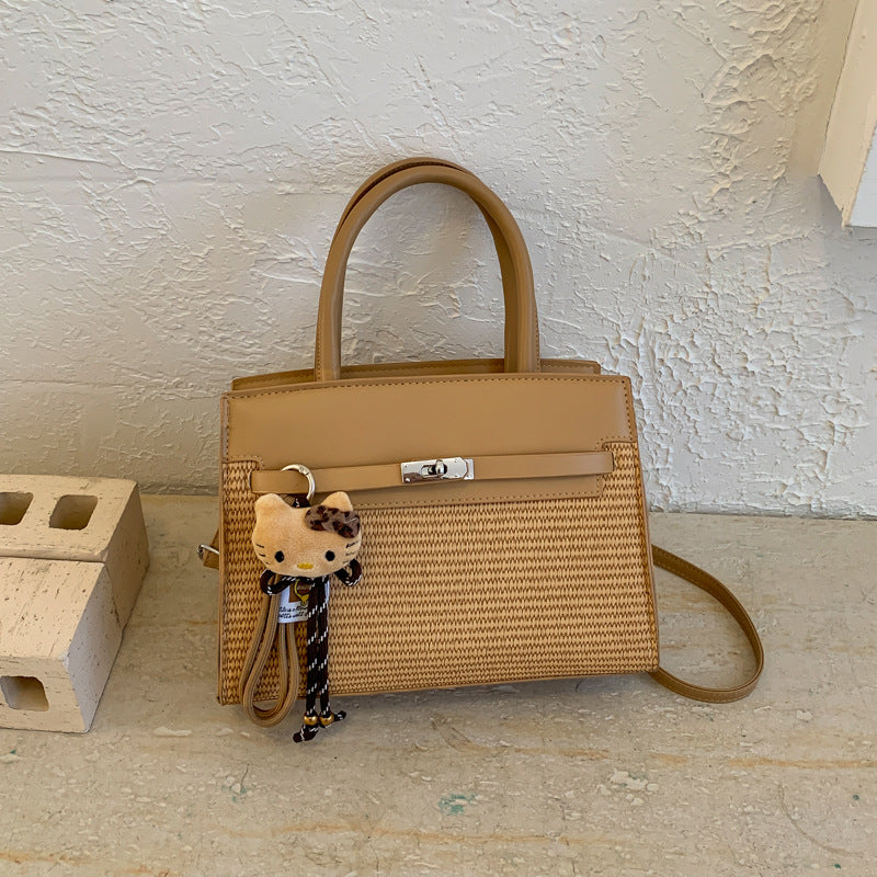 Damen elegante Handtasche mit hochwertigem Strickdesign und charmantem Anhänger Nord Taschen