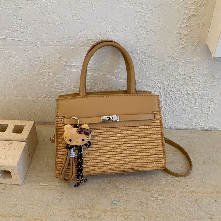 Damen elegante Handtasche mit hochwertigem Strickdesign und charmantem Anhänger Nord Taschen
