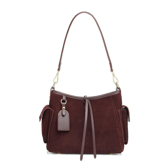 Damen Schultertasche aus feinem Wildleder mit praktischen Außentaschen Nord Taschen
