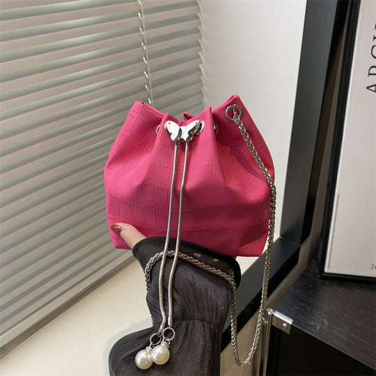 Damen Handtasche mit elegantem Kordelzug und detaillierter Schlangenprägung Nord Taschen