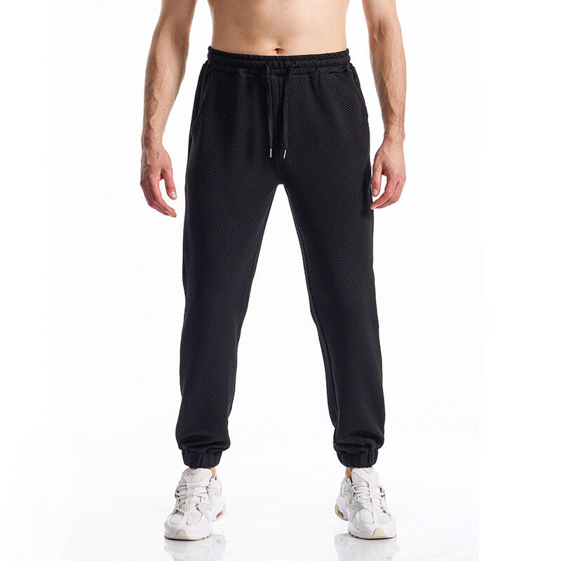 Herren Texturierte Jogginghose mit elastischem Bund, Tunnelzug und gebündeltem Beinabschluss Nord Taschen