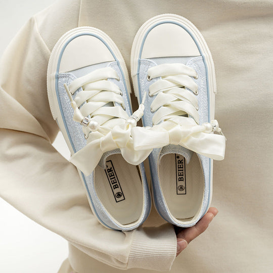 Damen Bequeme Plattform-Sneaker mit verspielten Schnürsenkeln und eleganter Oberfläche
