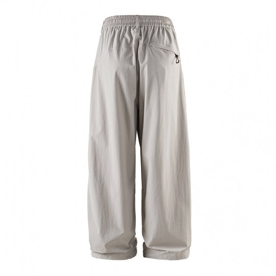 Unisex Weitgeschnittene technische Cargo-Hose mit Gummibund, Kordelzug und Reißverschlusstaschen Nord Taschen