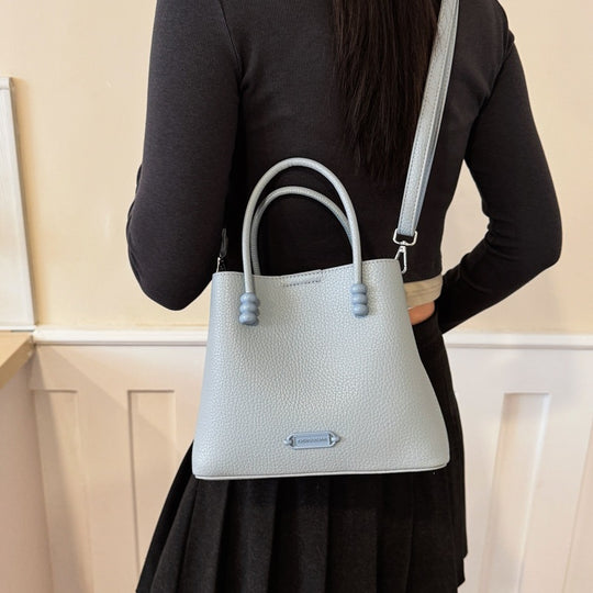 Damen elegante Hobo-Tasche aus geschmeidigem Kunstleder mit strukturierten Akzenten Nord Taschen