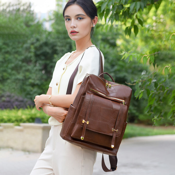 Damen eleganter Rucksack mit strukturiertem Design und goldenen Akzenten Nord Taschen