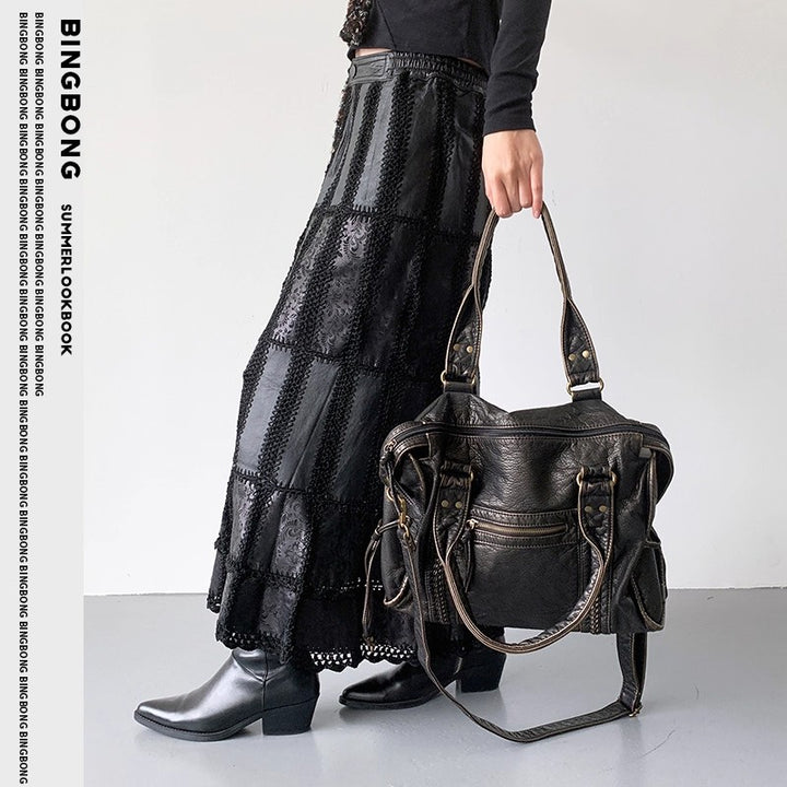 Damen Hobo-Tasche mit praktischen Reißverschlussfächern und eleganter Struktur Nord Taschen