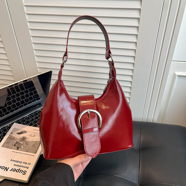Damen Hobo-Tasche mit elegantem Gurtverschluss und glänzender Oberfläche Nord Taschen