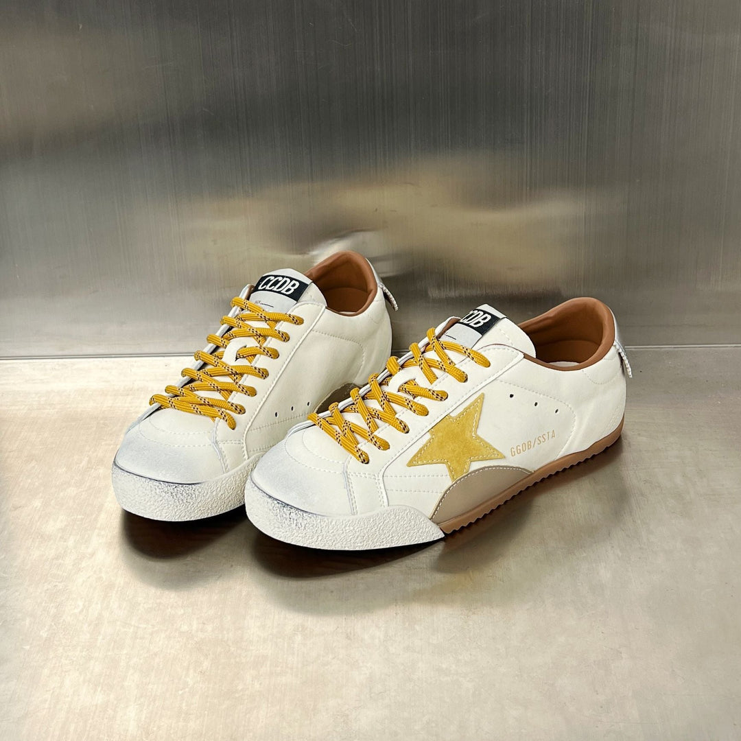 Damen Sneakers im sportlichen Design mit markantem Stern-Detail und ergonomischer Dämpfung