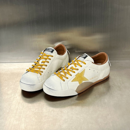 Damen Sneakers im sportlichen Design mit markantem Stern-Detail und ergonomischer Dämpfung