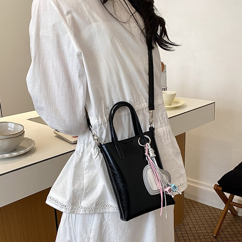 Damen Mini-Handtasche mit elegantem Anhänger Nord Taschen