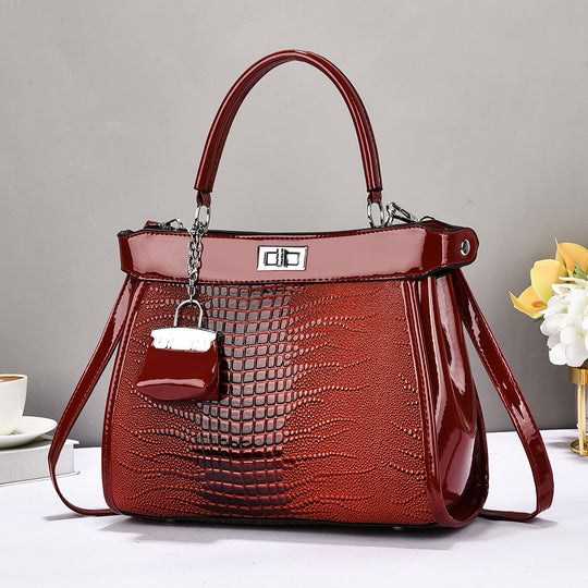 Damen Handtasche mit glänzender Krokodil-Prägung und abnehmbarer Mini-Clutch Nord Taschen