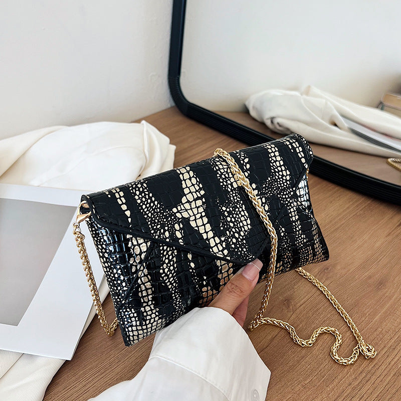 Damen elegante Clutch im schimmernden Krokodil-Look Nord Taschen