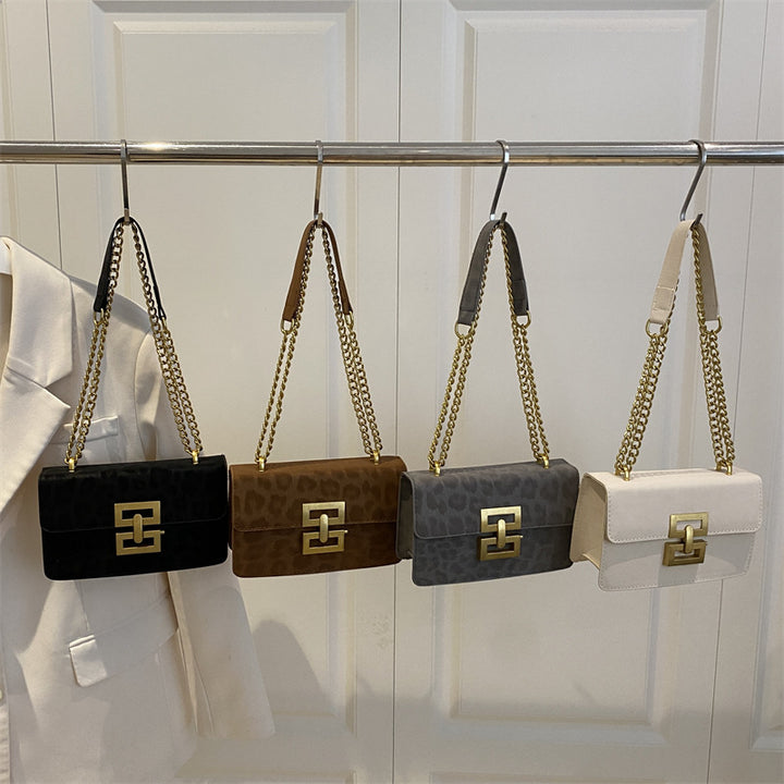 Damen Umhängetasche mit elegantem Kettenverschluss und strukturiertem Obermaterial Nord Taschen