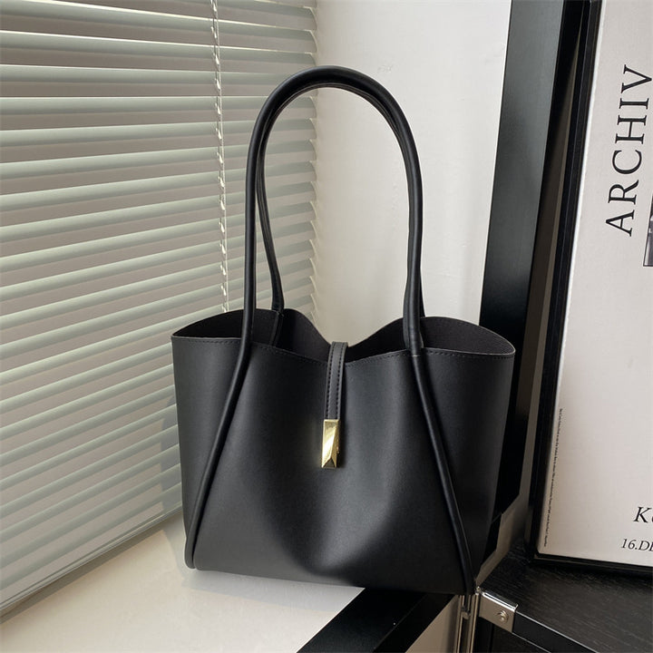 Damen elegante Tragetasche mit goldenen Akzenten Nord Taschen