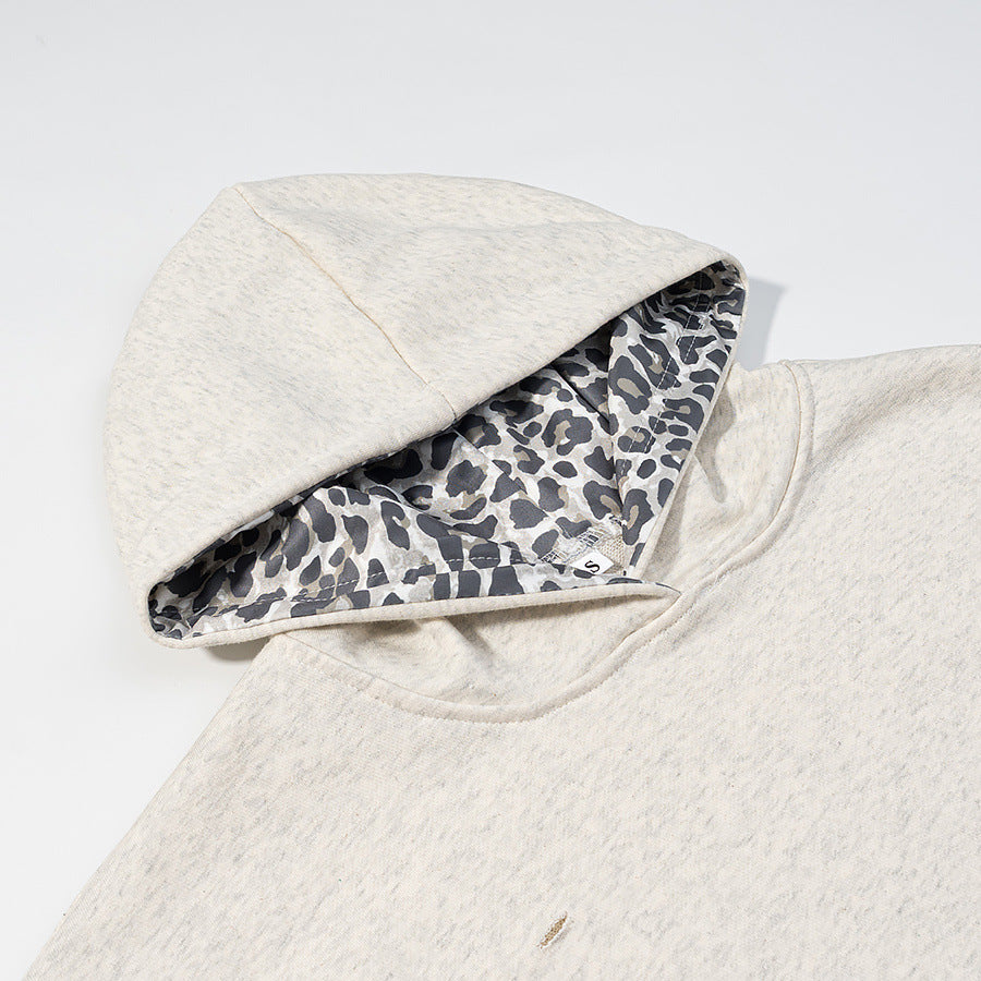 Damen Oversize‑Kapuzenpullover mit Leo‑Futter, Used‑Details und Kängurutasche Nord Taschen