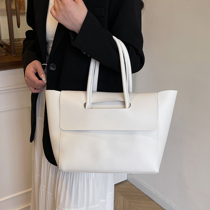 Damen elegante Handtasche aus hochwertigem Kunstleder mit raffiniertem Verschluss Nord Taschen
