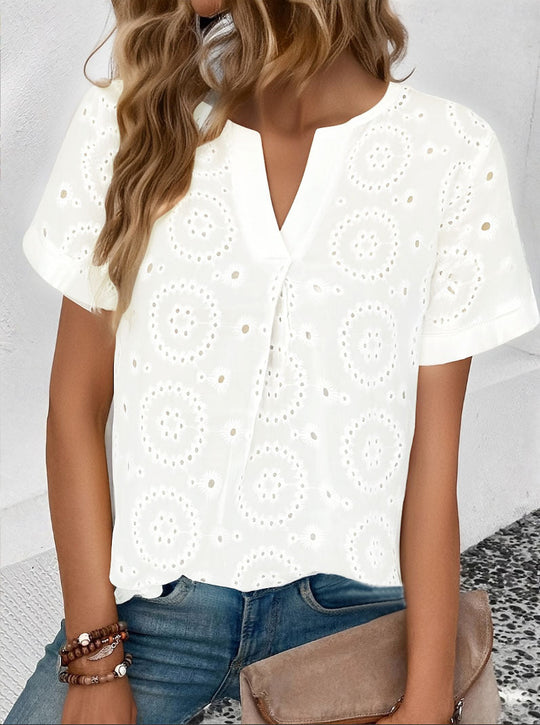 Damen Bluse mit floralen Lochstickereien und V-Ausschnitt