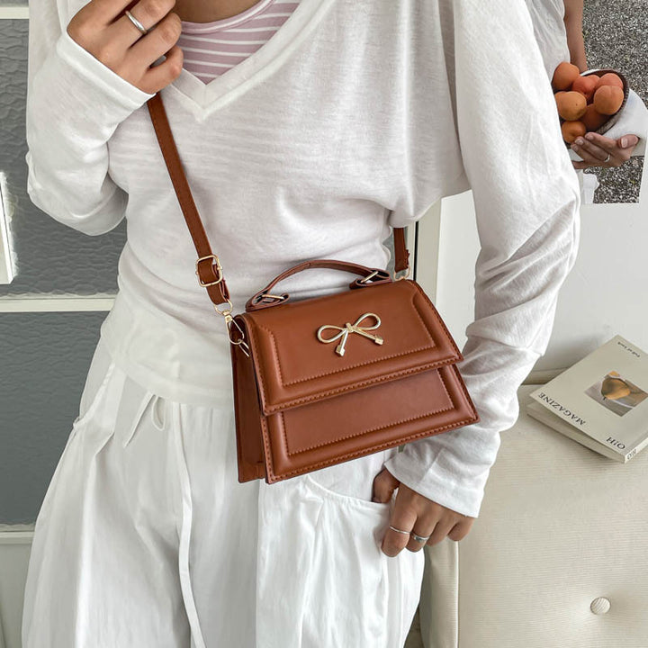 Damen elegante Handtasche mit verspieltem Schleifendesign Nord Taschen