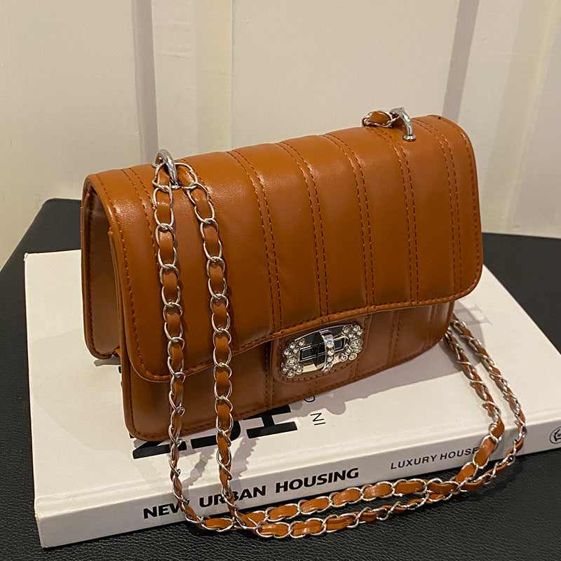 Damen Umhängetasche mit gestepptem Design und elegantem Verschluss Nord Taschen