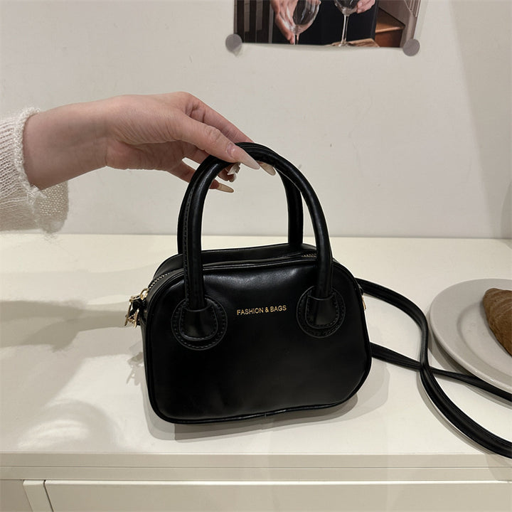 Damen elegante Umhängetasche mit rundem Design Nord Taschen