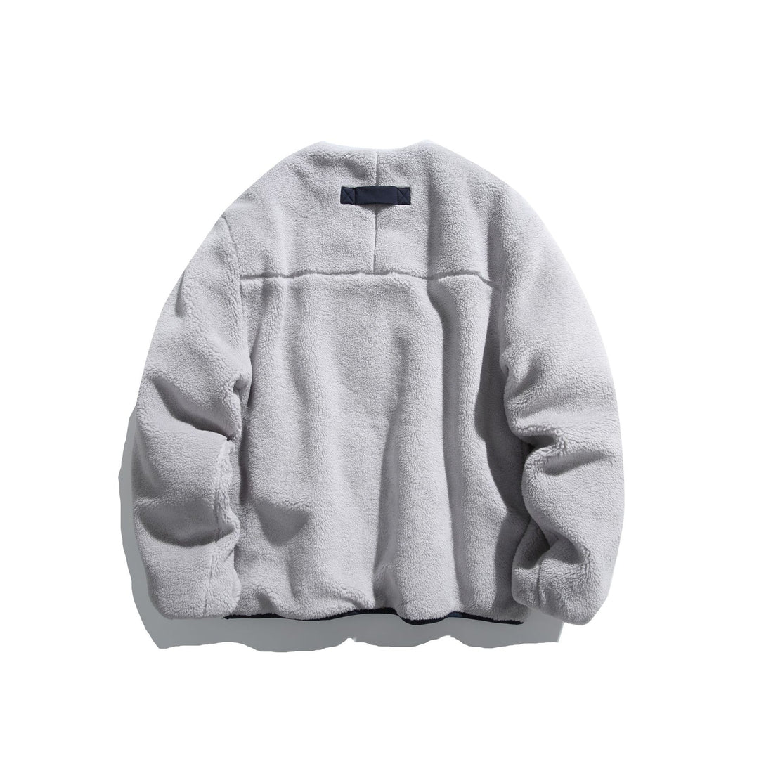 Unisex Kurz geschnittene Teddy‑Fleecejacke mit Nylon‑Brusttasche und durchgehendem Reißverschluss Nord Taschen
