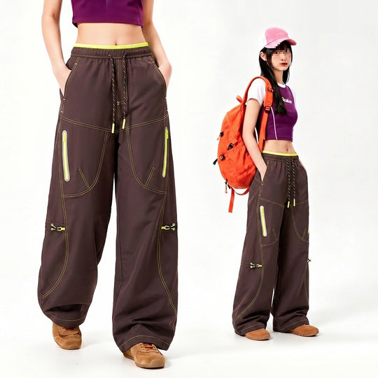 Damen Oversize Tech-Loungehose mit Kontrastnähten, reflektierenden Reißverschlusstaschen & Kordelbund Nord Taschen