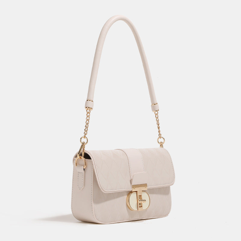 Damen Umhängetasche mit eleganter Steppung und fein gearbeiteten Metallakzenten Nord Taschen