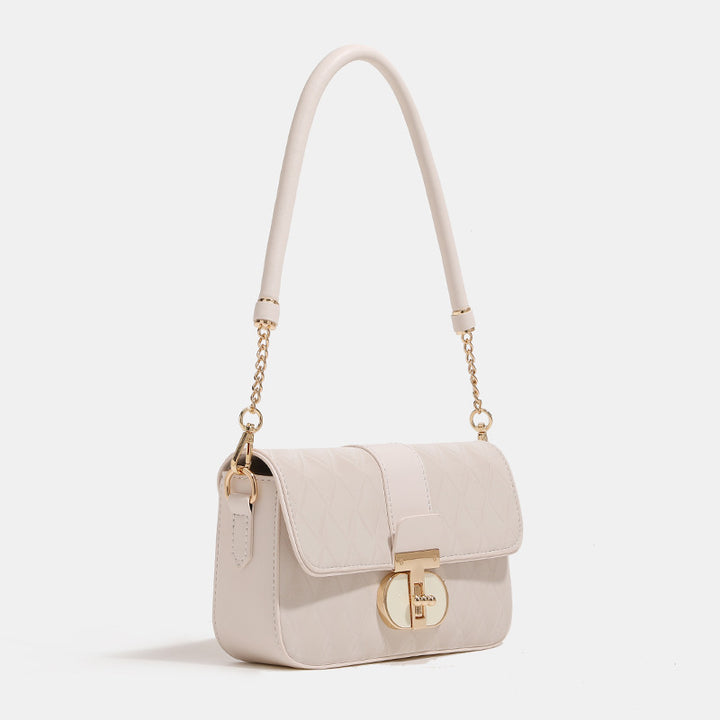 Damen Umhängetasche mit eleganter Steppung und fein gearbeiteten Metallakzenten Nord Taschen
