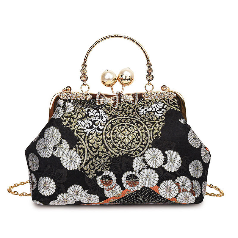 Damen elegante Umhängetasche mit floralem Design und Kunstlederakzenten Nord Taschen