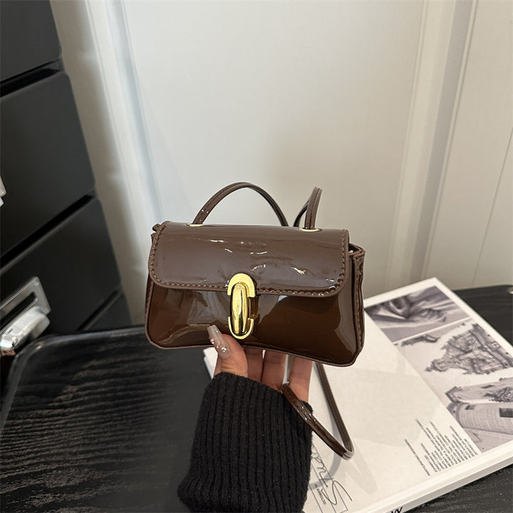 Damen Mini-Umhängetasche mit glamourösem Klappverschluss Nord Taschen